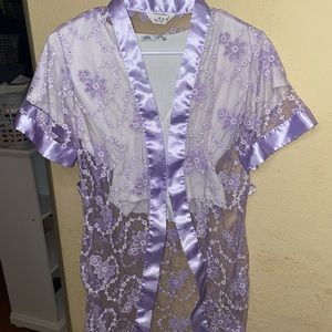 Beautiful lavender mesh robe with flower detailing.